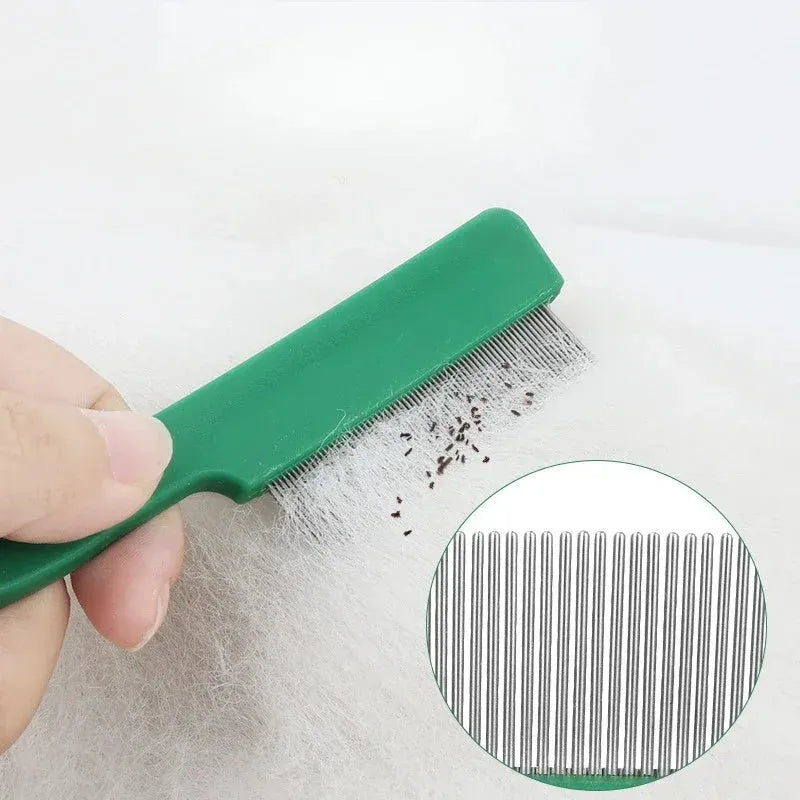Green plastic handle flea comb with stainless steel pins for dogs and cats, shown next to a ruler indicating 129mm length.