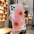 Floral print TPU phone case for iPhone showing pink flower design on back cover