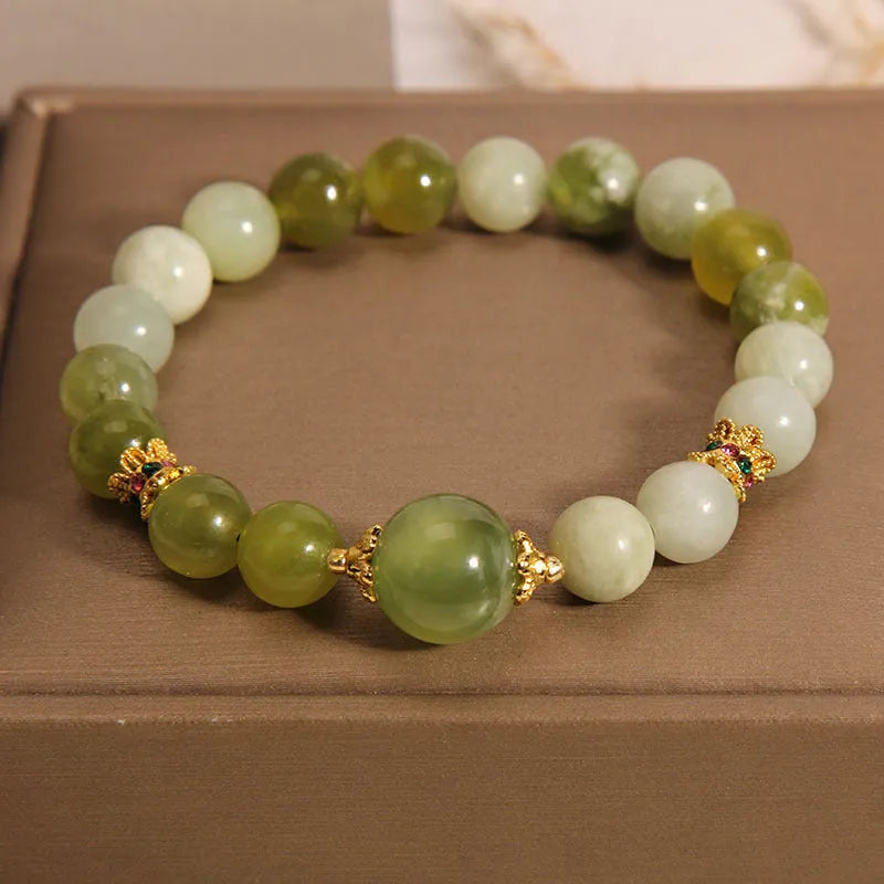 Women's jade bracelet in Xiuyan green colour with original Mori style design