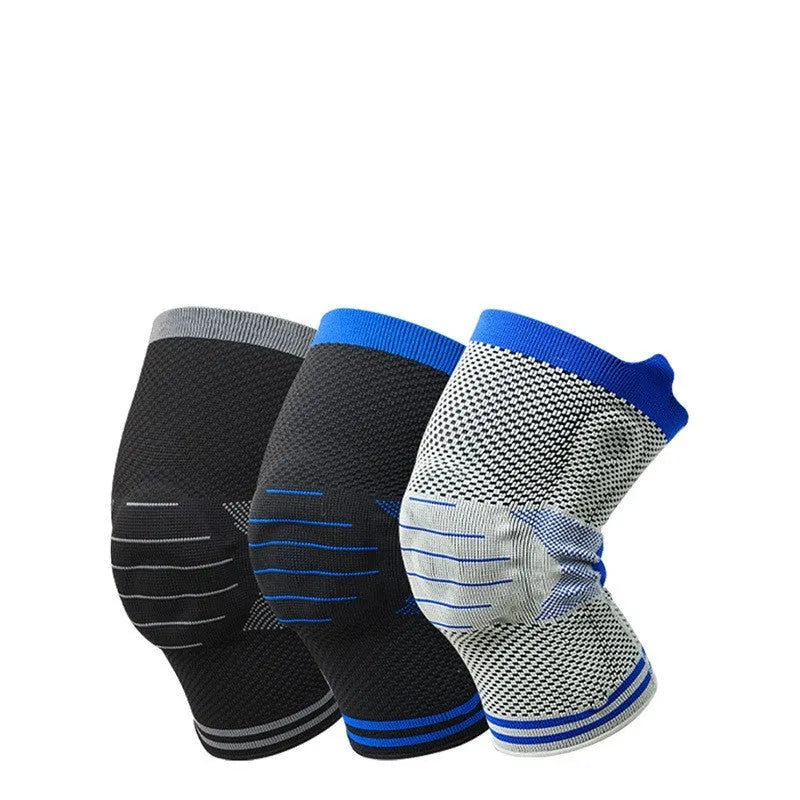 A black and grey cotton knee pad showing a silicone massage spring bar shock absorber on the knee area.