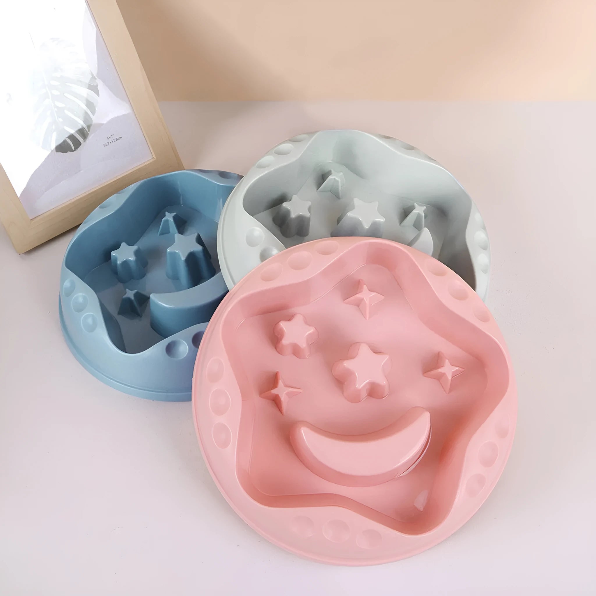 Moon Star Wings slow feeder dog bowl in blue colour with raised centre and non-slip base.