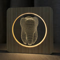 Wood colour tooth-shaped acrylic night lamp measuring 190x190x30mm with USB cable