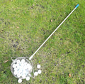 Stainless steel golf ball picker with open claw design on metallic background