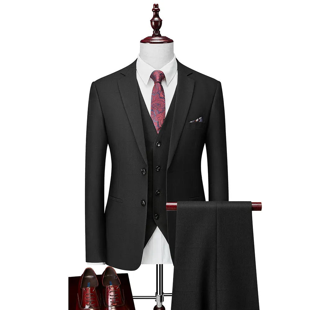 Men's navy blue three-piece plaid suit with slim fit design on hanger