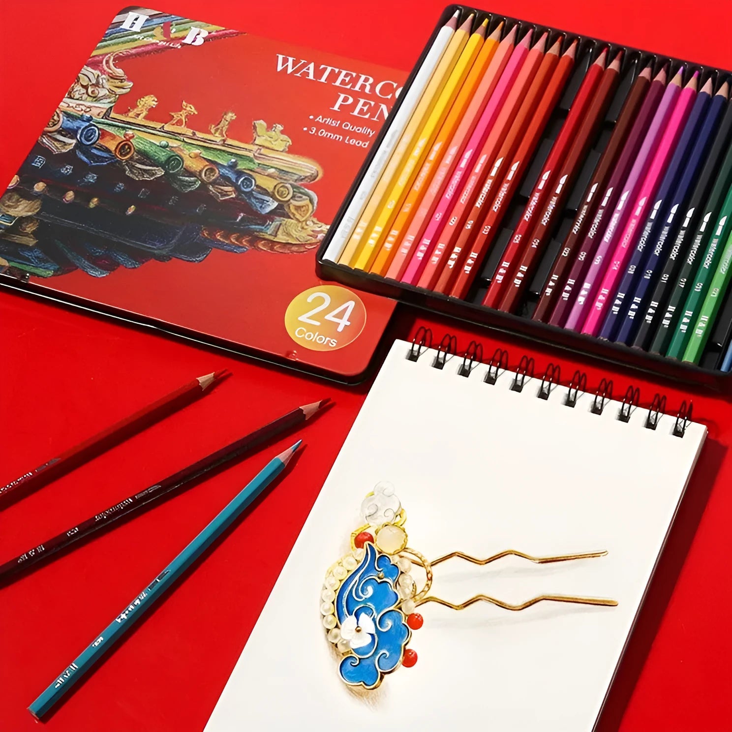 Water-soluble coloured pencil set with 24 colours in iron storage box showing pencil dimensions