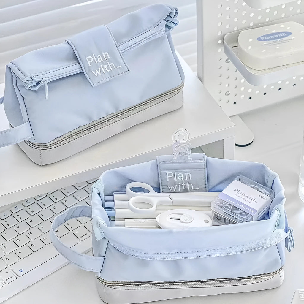 Polyester folding double-layer pencil case in dark blue, blue, and cream white colours.
