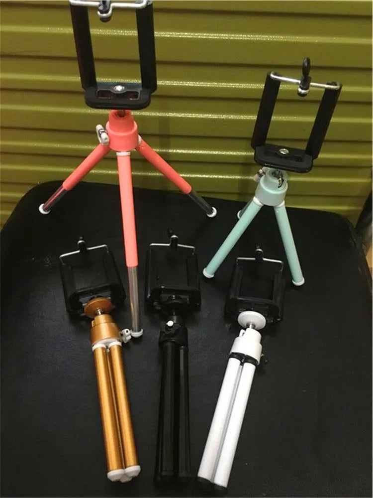 Desktop phone holder with two-section adjustable bracket in black and silver colour options