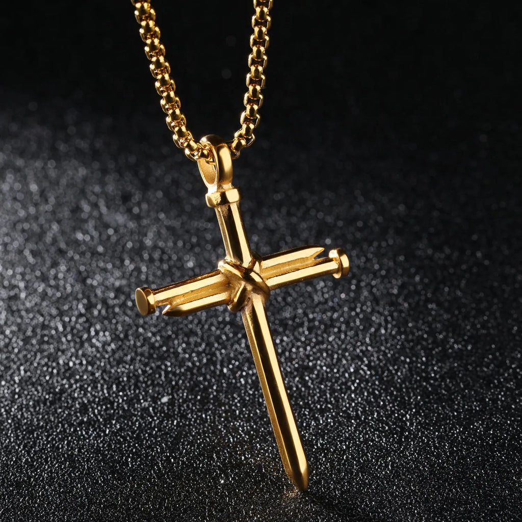 Titanium steel cross nail pendant necklace for men in silver finish on display
