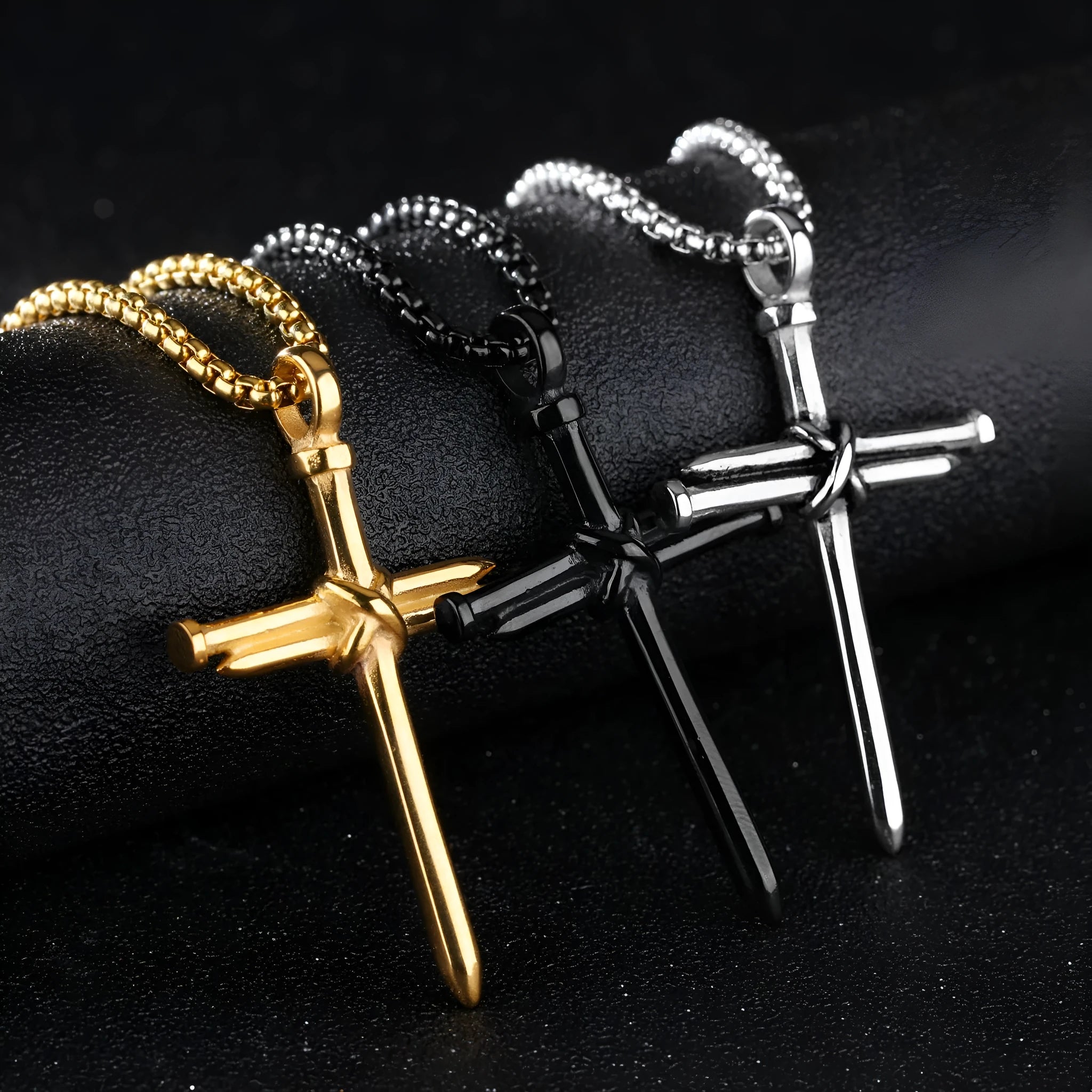Titanium steel cross nail pendant necklace for men in silver finish on display