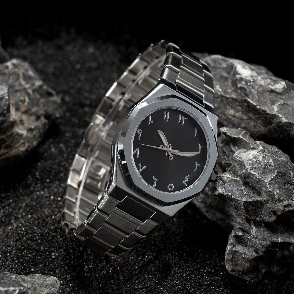 Men's silver black business watch with stainless steel belt and quartz dial.