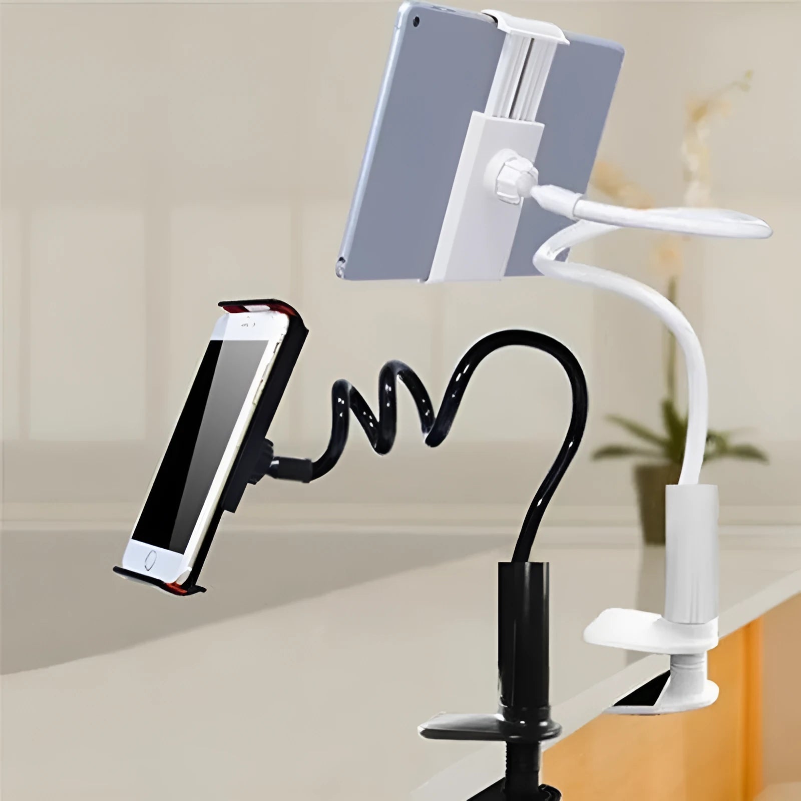 Black flexible tablet holder with suction cup base bent to hold a phone at an angle.