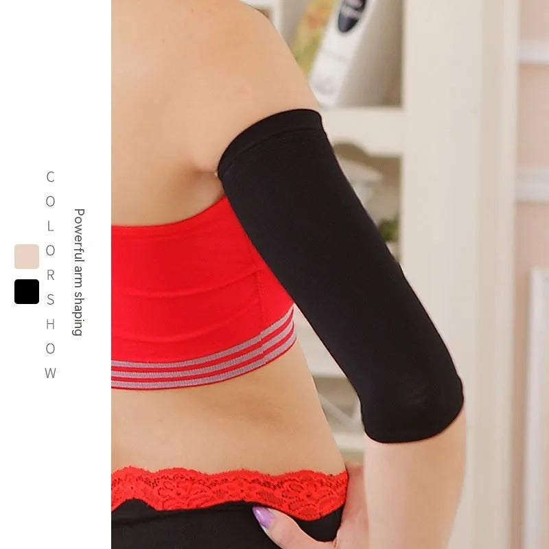 A pair of women's solid colour shaping arm sleeves in nylon fabric, shown in black and skin colour options.