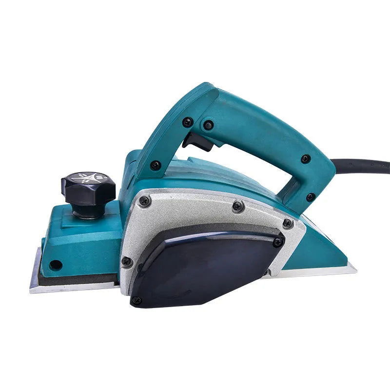 Red aluminium-shell electric wood planer with 82mm planing width on workbench