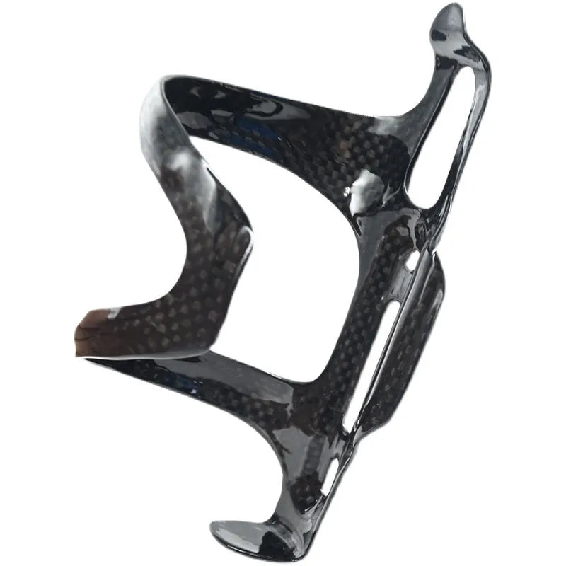 Black carbon fibre side pull bicycle water bottle cage showing mounting holes.