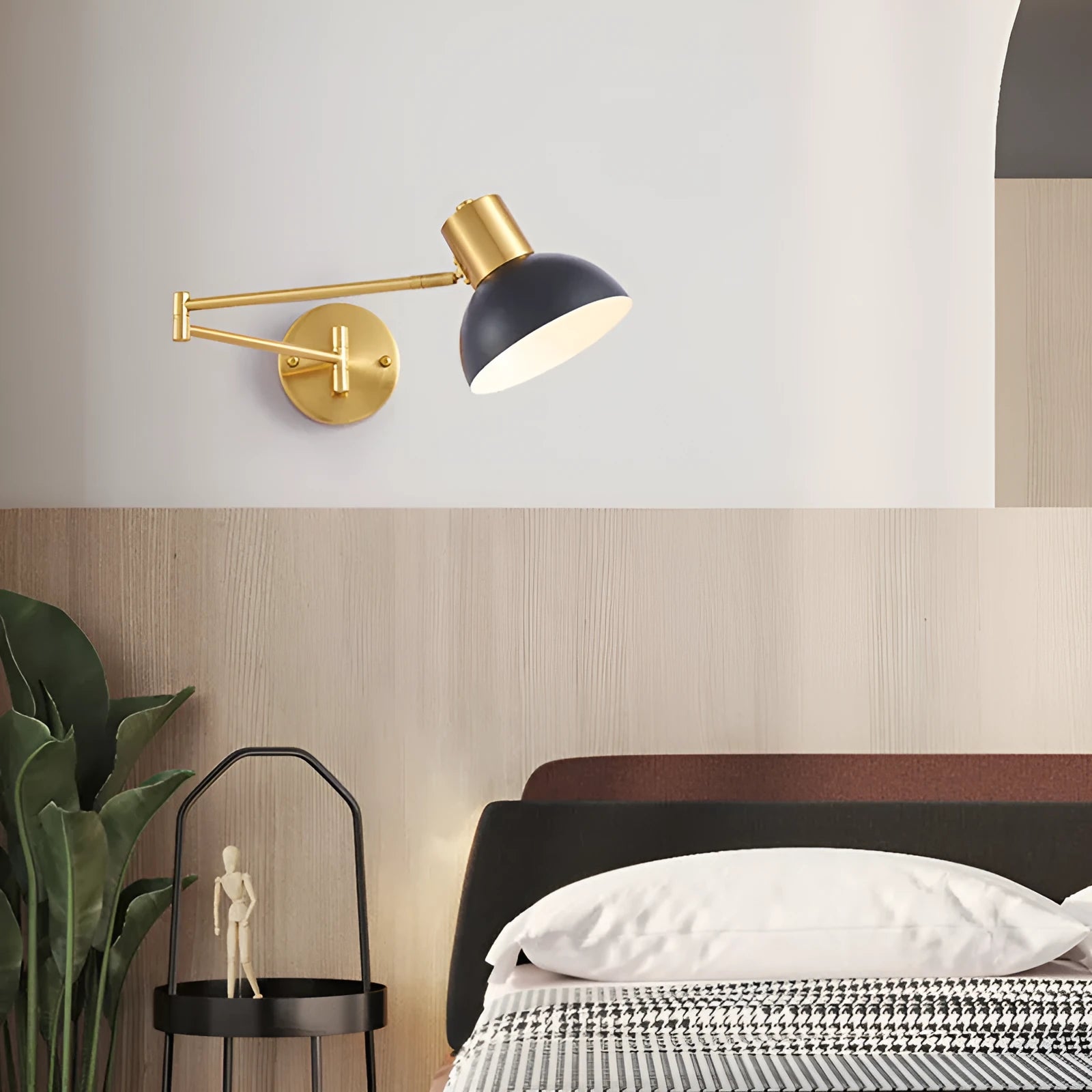 Modern minimalist double-section rocker arm wall lamp mounted on a wall, showing adjustable joints.