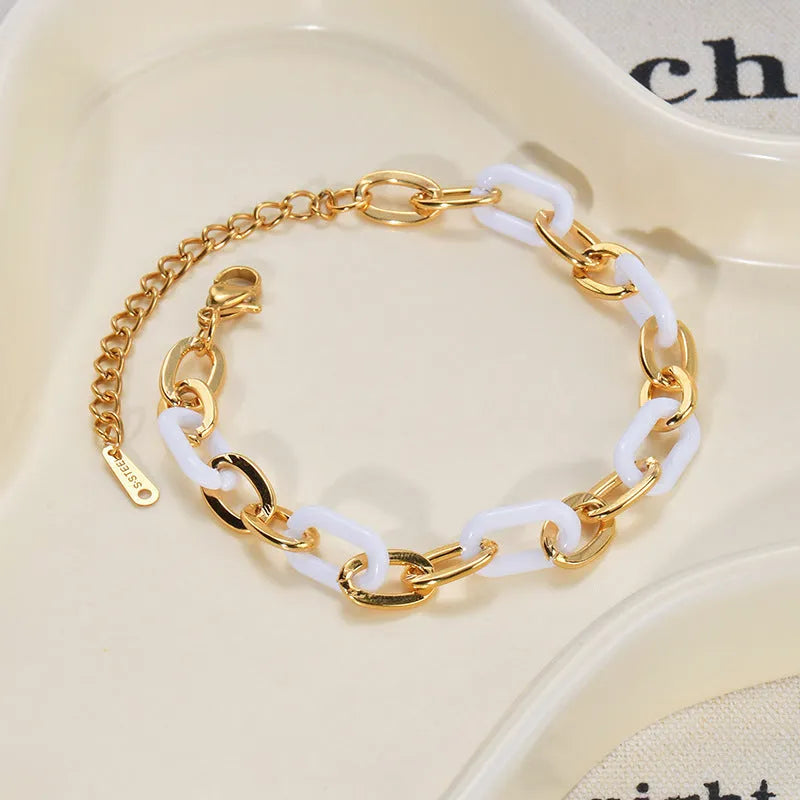 Women's stainless steel bracelet with resin heart charm and double-layer love design