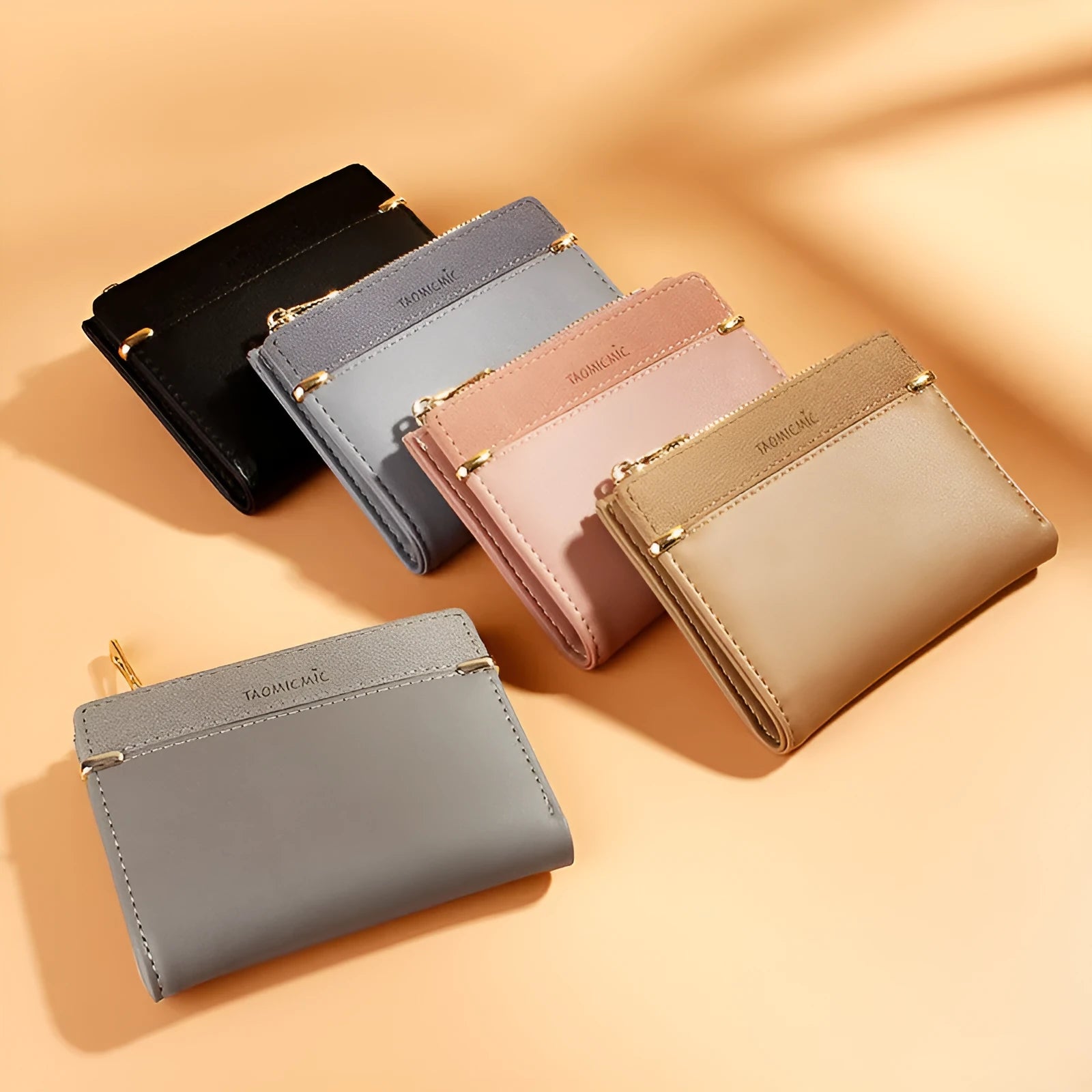 Black PU leather ladies wallet open to show multiple card slots, a bill compartment, and a zippered section.