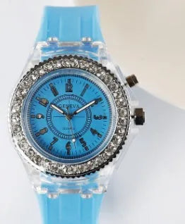 Women's LED luminous quartz watch with round dial and silicone strap in multiple colour options