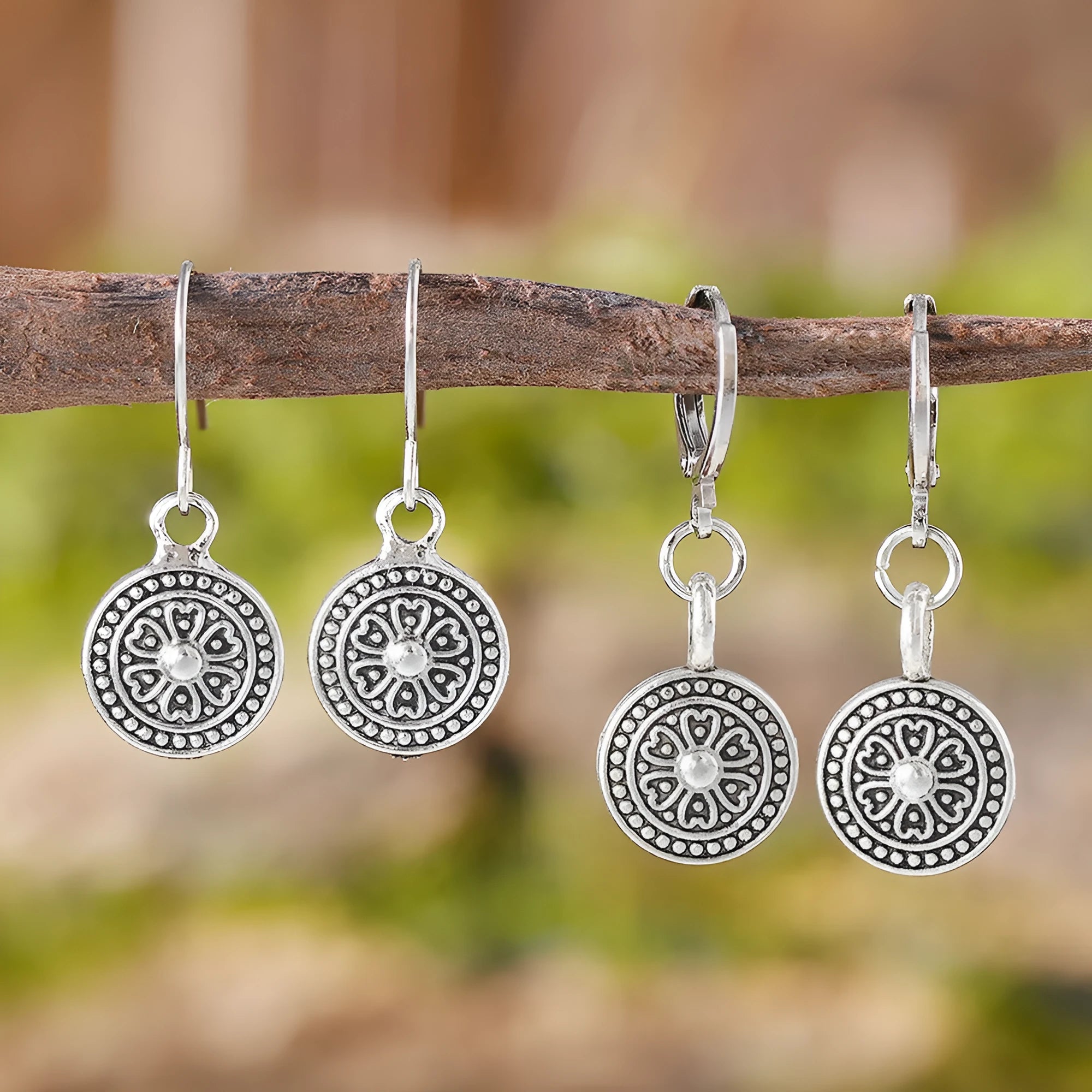 Bohemian style geometric round earrings with distressed ethnic print and retro electroplated finish