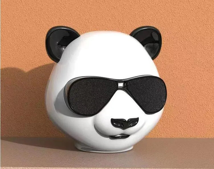 Classic style portable mini Bluetooth speaker with USB charging port.