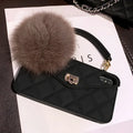 Dark green grid pattern TPU phone case with a soft plush texture for iPhone models.