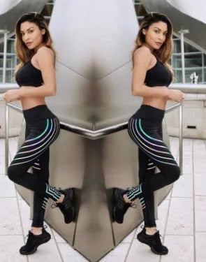 Women's black workout leggings with night-glowing print patterns, high-waisted pencil pants design