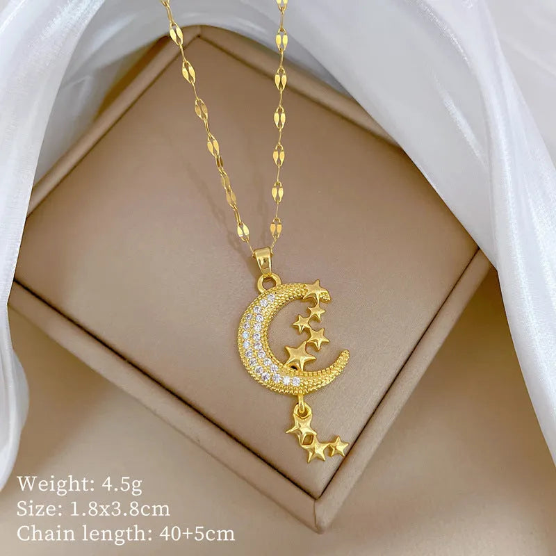 Moon pendant necklace with geometric tassel design and diamond embellishment on stainless steel chain