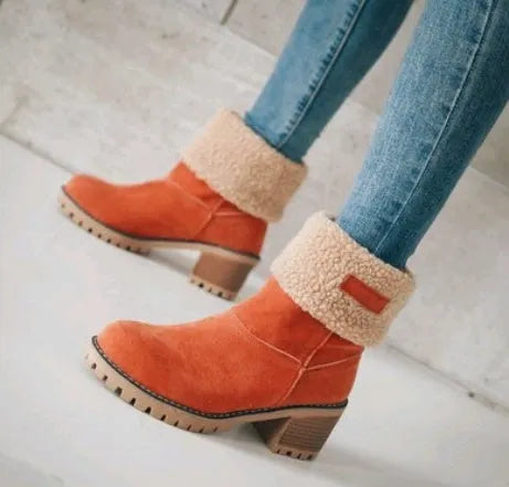 Women's suede mid-calf snow boots in black with a thick flat heel and round toe.