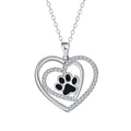 Electroplated copper necklace with heart-shaped dog paw print pendant on cross chain