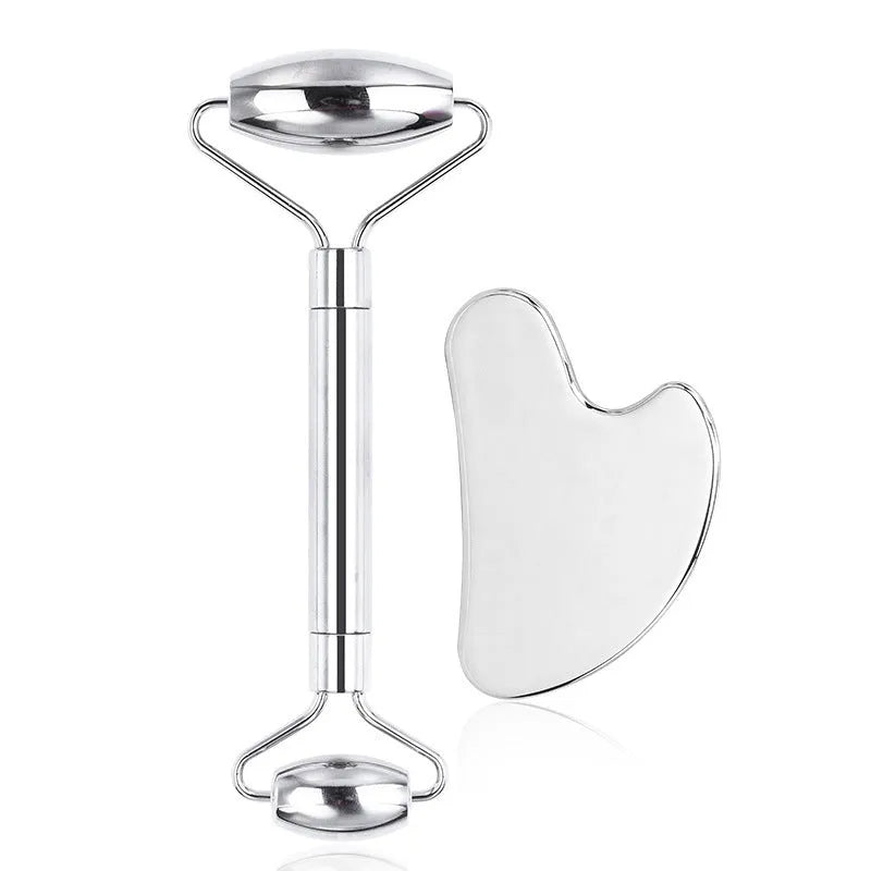 Stainless steel heart-shaped massage board with roller and scraping plate for facial care