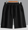 Cotton summer shorts in straight cut design showing micro-elastic fabric and available colour options