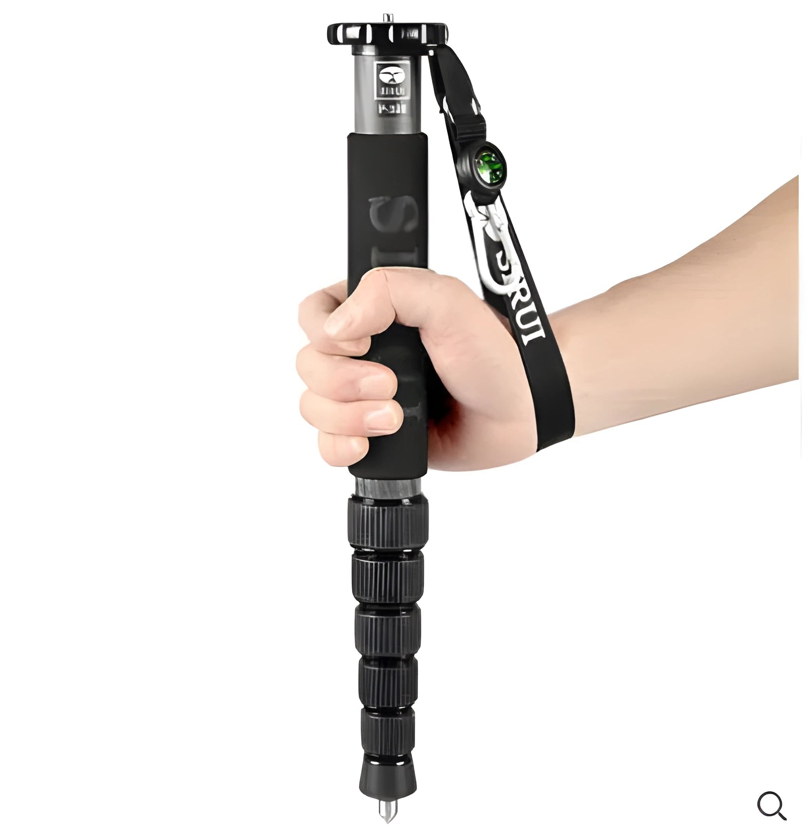 Black carbon fibre telescoping camera monopod extended to its full height.