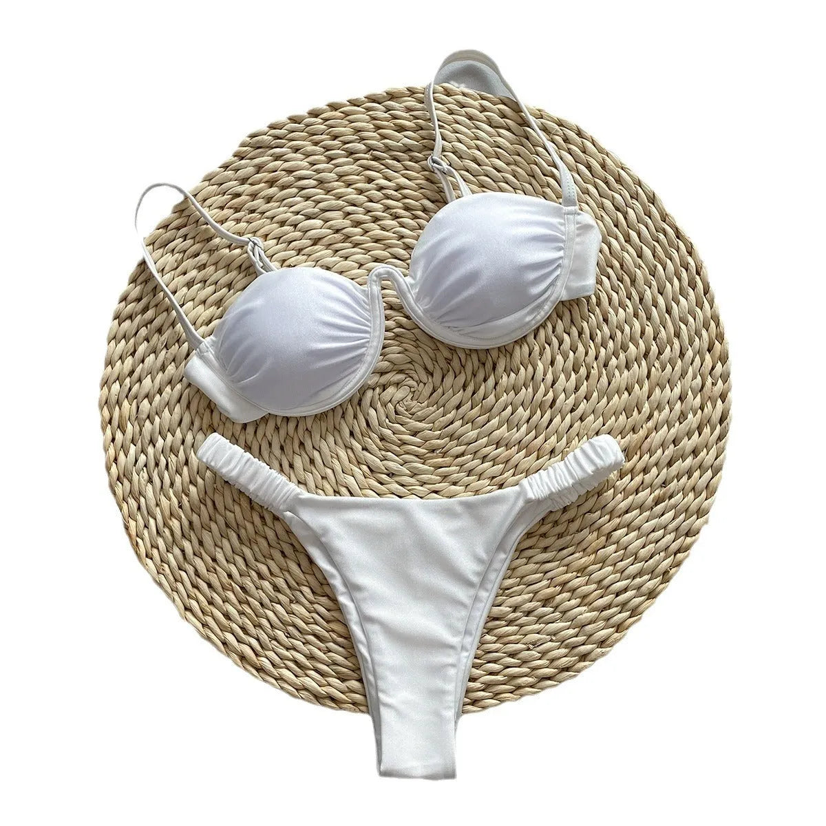 Women's black underwire bikini swimsuit with split briefs, shown on a model.