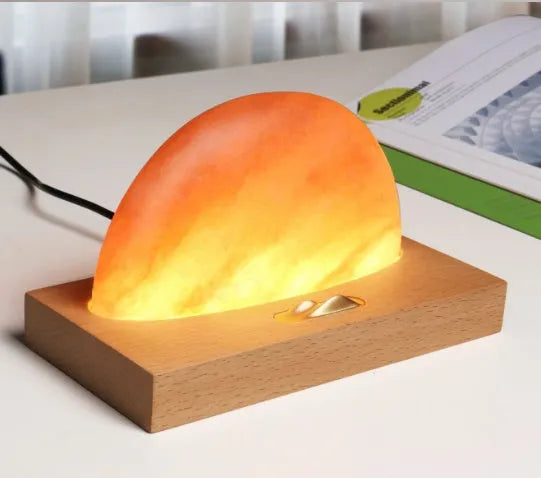 Sunrise Oriental salt lamp with beech wood base, natural salt block, and Qi wireless charging pad