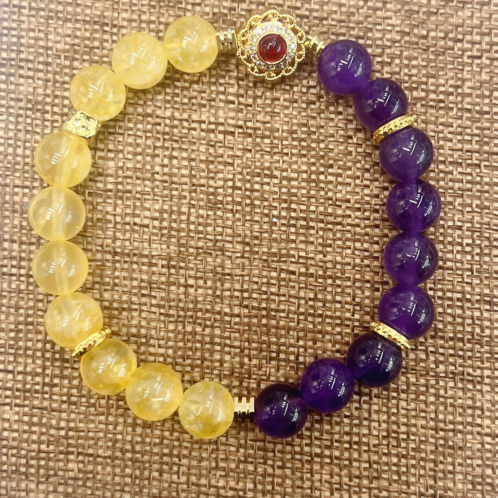 Handmade women's amethyst crystal bracelet with yellow and purple colour tones