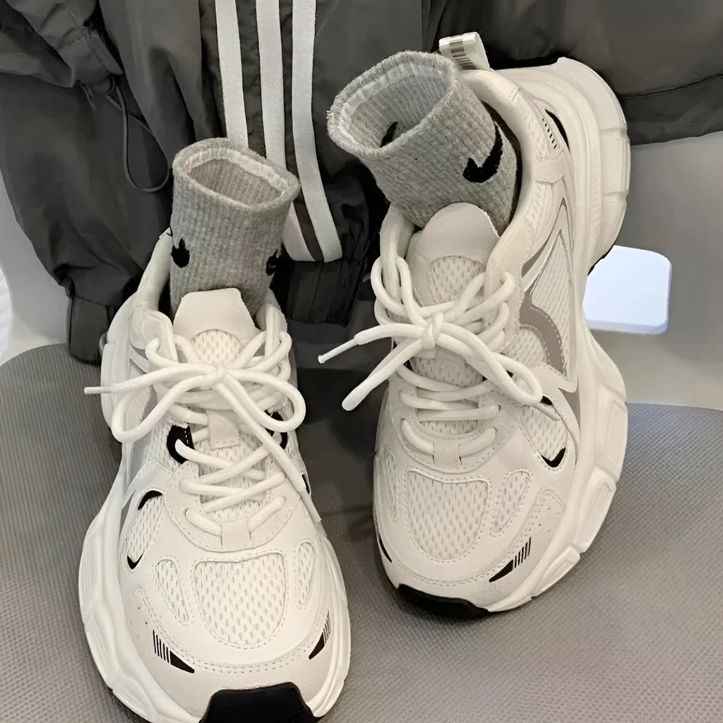 Beige mesh platform sports shoes with wedge heel and front lace-up closure on rubber sole