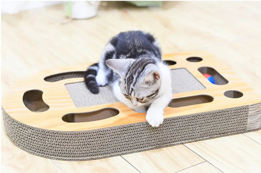 Brown corrugated cat scratch board with attached ball measuring 50.5x30.5x6cm