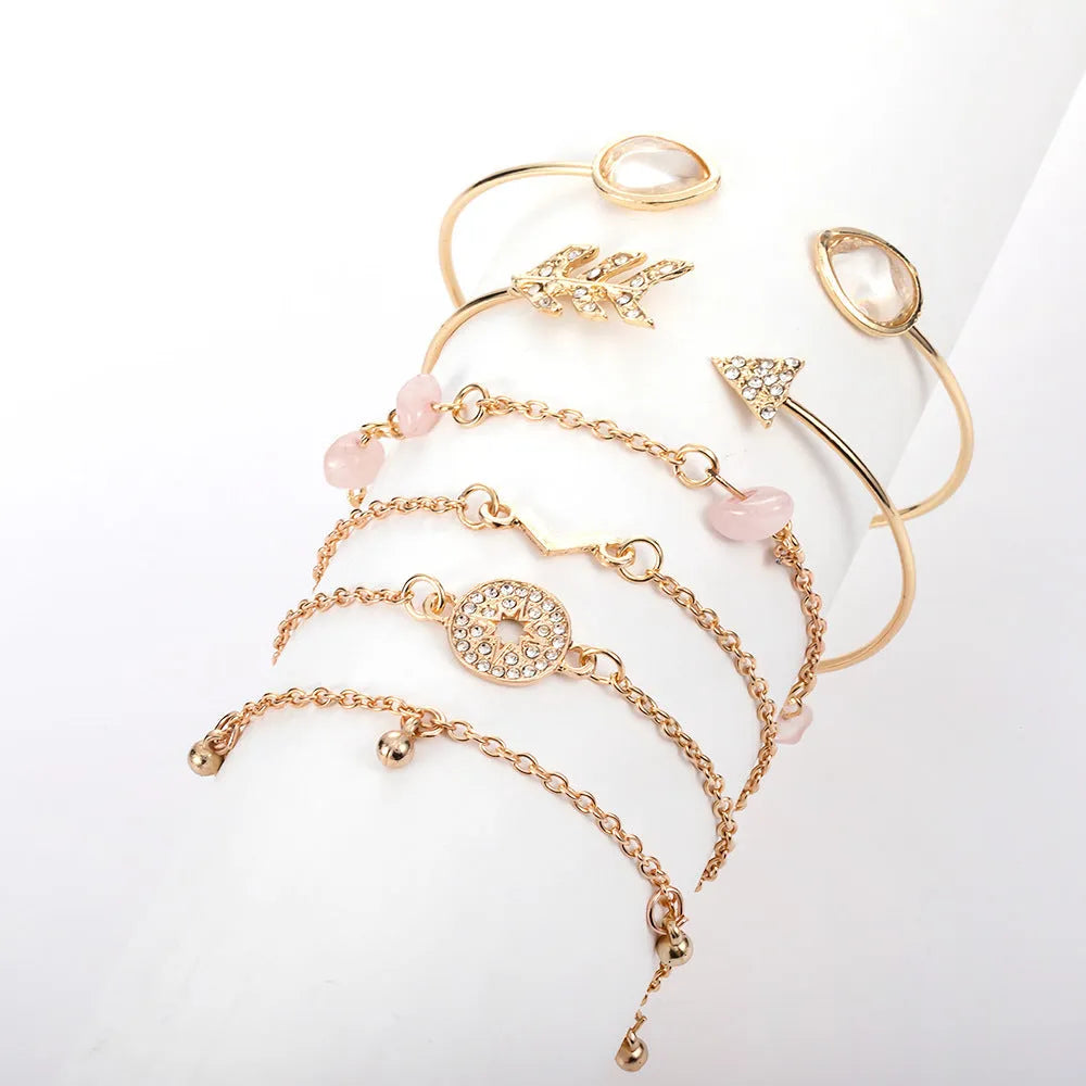 Six-piece zinc alloy women's bracelet set with golden spots, drill arrows, water droplets, and V-shaped links