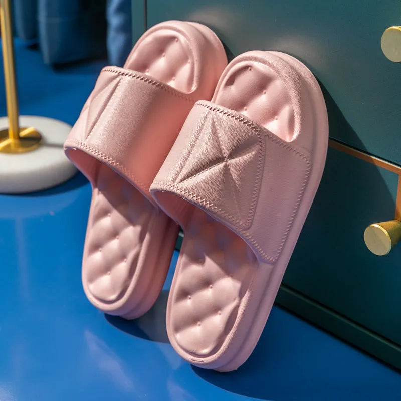 Pair of EVA bathroom slippers with thick non-slip sole shown in colour options.
