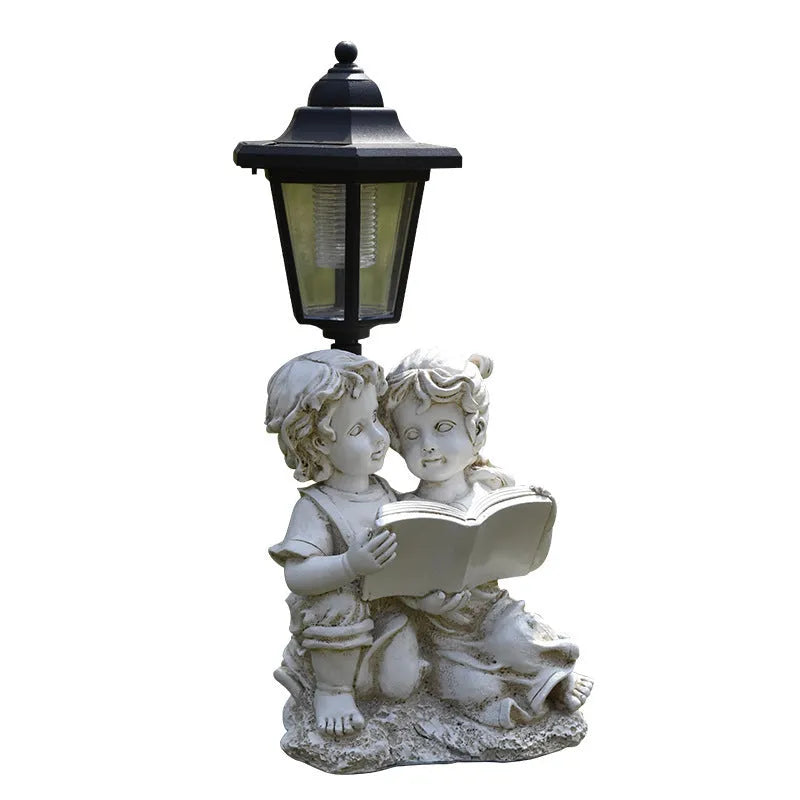 Decorative hexagonal solar garden lamp with animal sculpture design on patio.