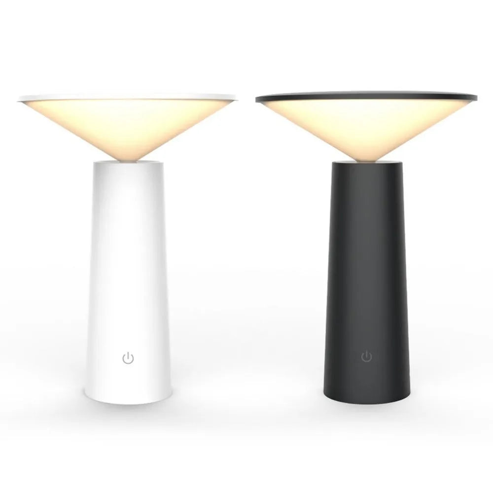 Black or white USB rechargeable LED desk lamp with touch sensor and adjustable head on a desk.