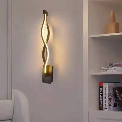 Nordic minimalist LED wall lamp with silicone shade for bedside use, black finish