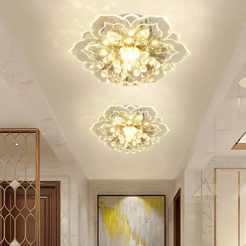 Modern crystal ceiling lamp with flower-shaped acrylic and crystal shade showing LED lighting