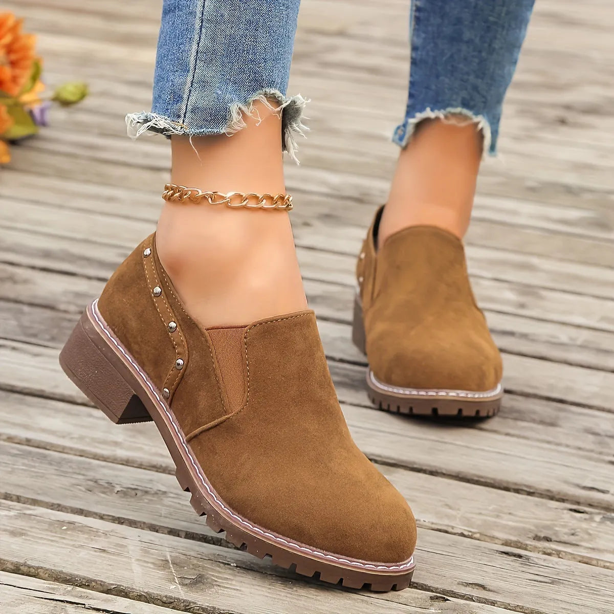 Plus size women's suede ankle boots with low heel, round toe, and elastic band in black
