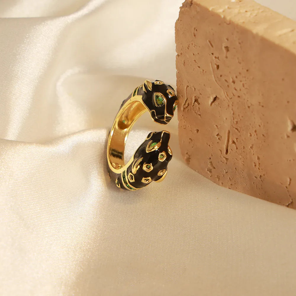 Black cheetah pattern open ring with geometric design on copper base