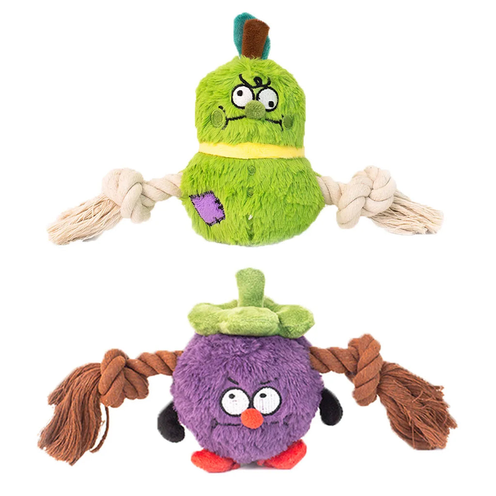 Green interactive dog plush rope knot tug toy with molar tooth chew centre on a white background.