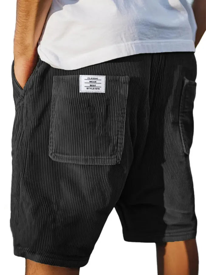 Men's grey corduroy shorts with multiple pockets and embroidery detail on a straight-leg fit