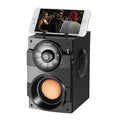 Black portable mini home audio speaker system with subwoofer and 3.5mm audio cable
