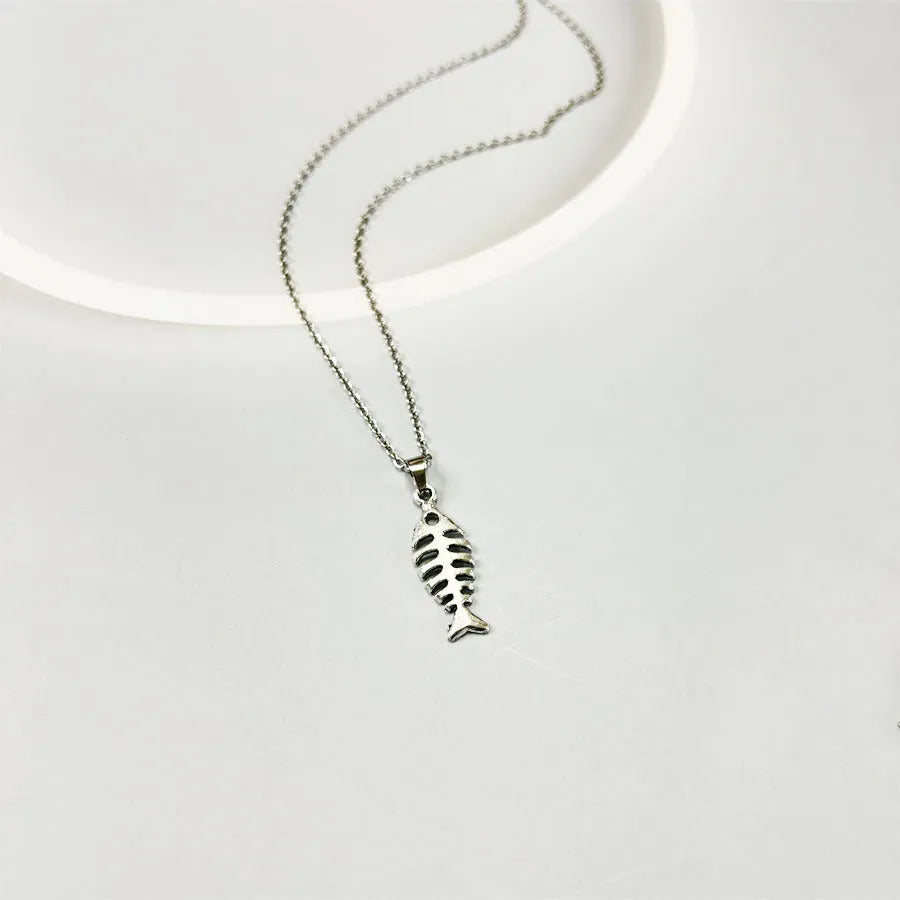Retro-style alloy fishbone pendant necklace with adjustable chain and matching earrings.