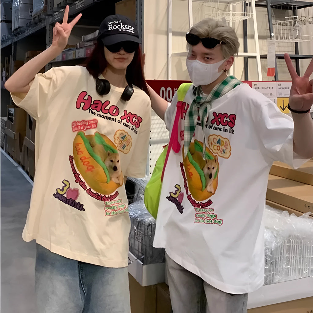 Cartoon hamburger dog printed cotton t-shirt in loose fit showing white, apricot and sky blue colour options